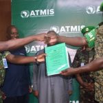 Lt Gen Sam Okiding Hands Over ATMIS Office, Returns To Uganda As Deputy CDF