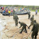 UPDF Marks 45th Tarehe Sita With Community Clean-Up At Rweshama Landing Site